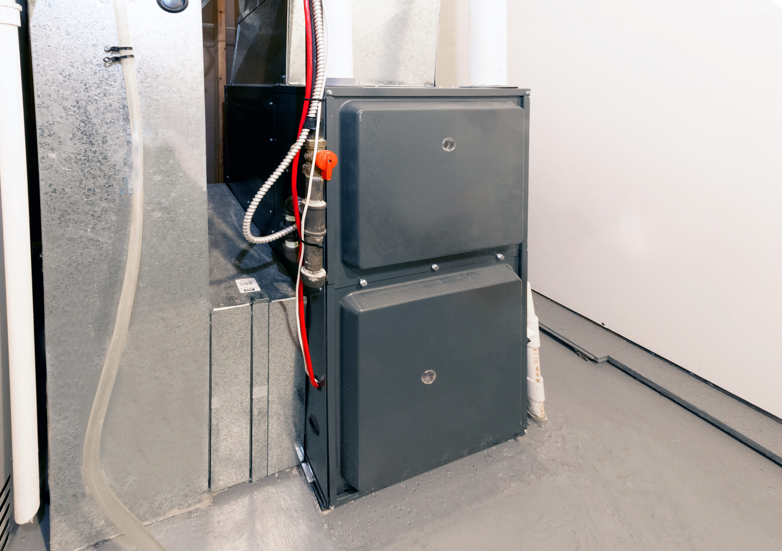 An electric furnace installed in the basement of someone’s home