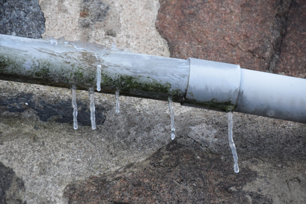 Frozen pipe in residential plumbing system in the winter