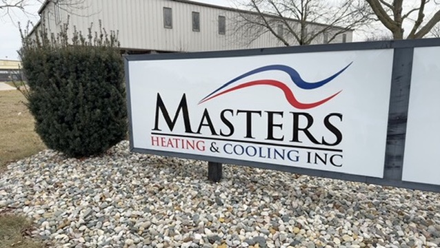 Old, dirty air filter behind a new, clean air filter